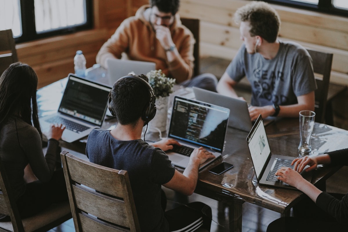 A group of developers working together at a table
