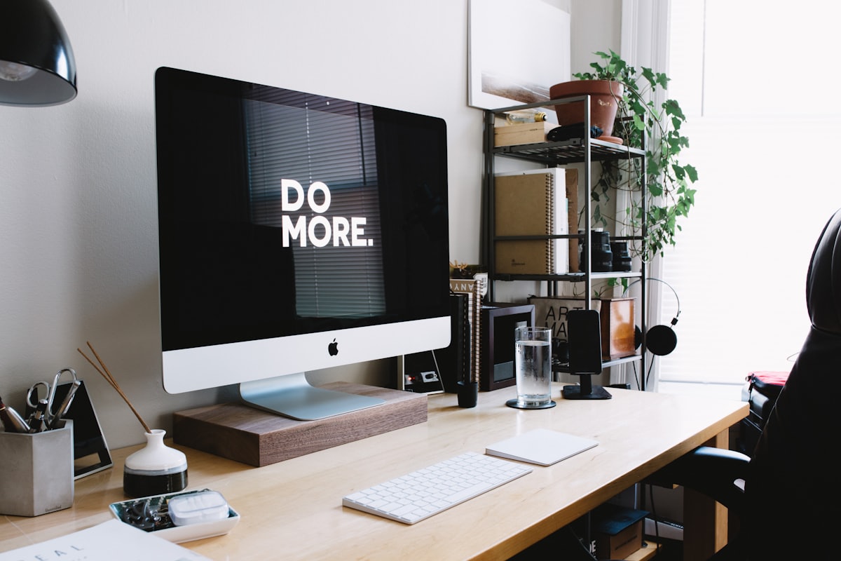 A desk workspace with a computer
